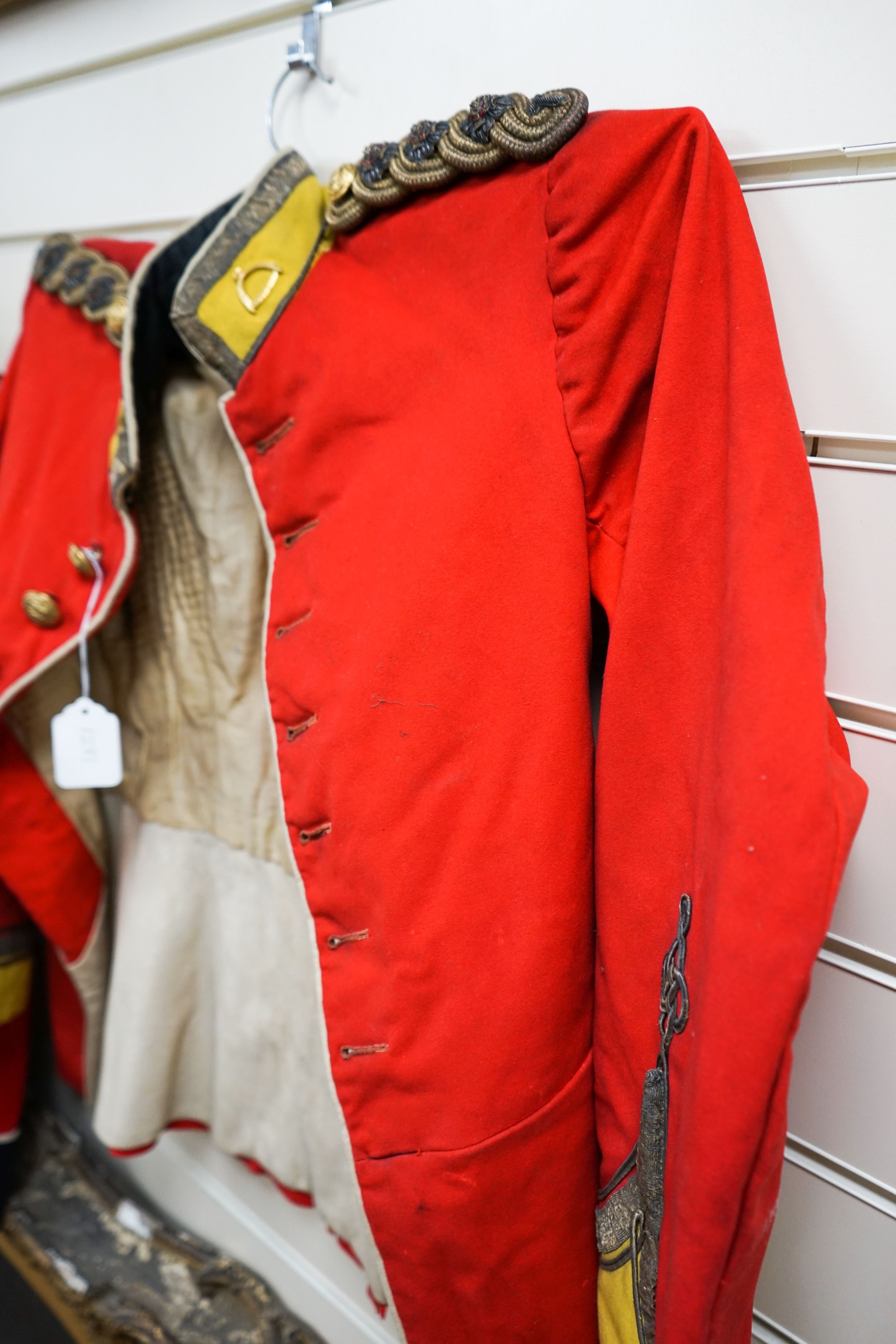 A Royal Hampshire regimental tunic and a Coldstream Guards tunic (2)